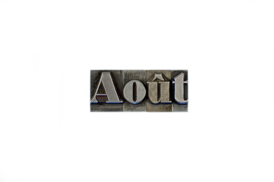 Ao&ucirc;t / caracteres d'imprimerie en plomb 