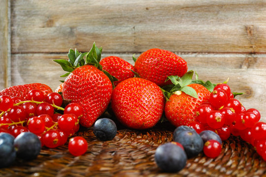 Fresh organic strawberry, blue and red berry