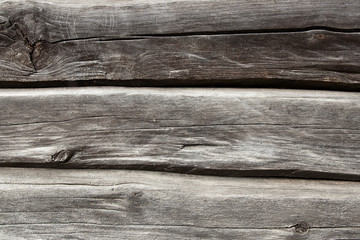 Country house wall from old wooden logs. Natural wooden backgrou