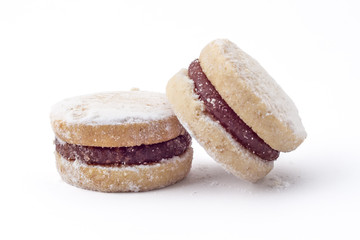 Two Vanilla Jam Cookies closeup, Vanilice, Serbian small sandwich cookie on white background