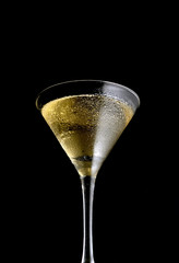 martini glass on a black background
