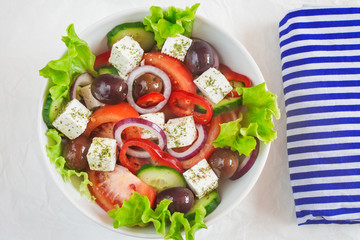 Traditional greek salad with fresh vegetables and feta cheese