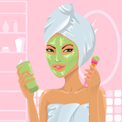 Girl applying facial mask with brush