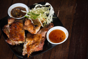 roasted chicken on wooden table, 