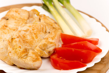 Breast of chicken fried with spices