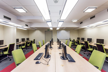 Modern university classroom with computers