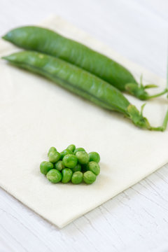 Green peas and pods, close-up