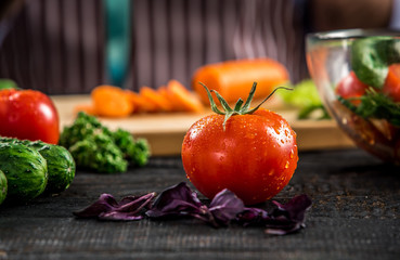 Male hands cutting vegetables for salad