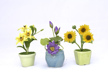 Artificial flowers on a white background