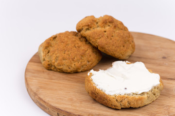 Bread with cream cheese isolated on white background