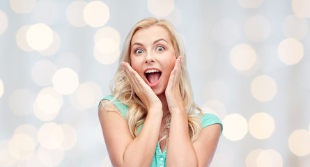 surprised smiling young woman or teenage girl