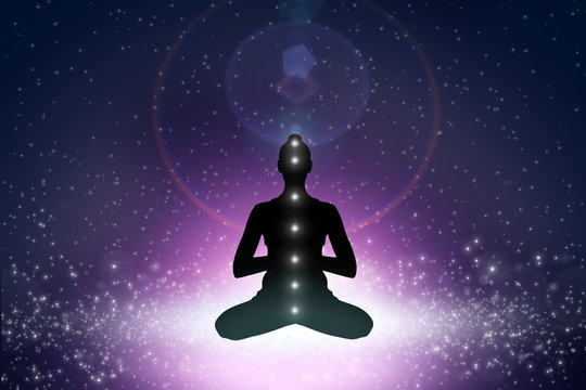 Silhouette of  woman in yoga position