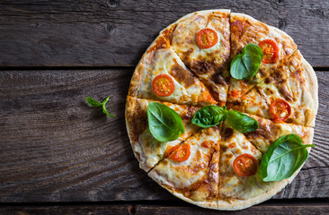 Pizza with fresh basil