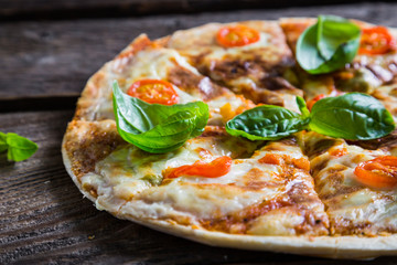 Pizza with fresh basil