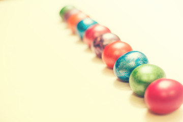 Easter eggs isolated on white wooden background