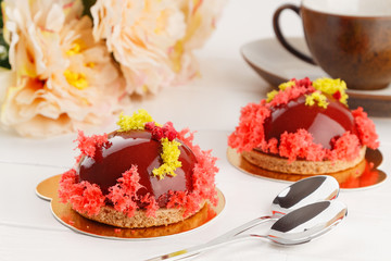 Red glazed pastry wiht sponge cake