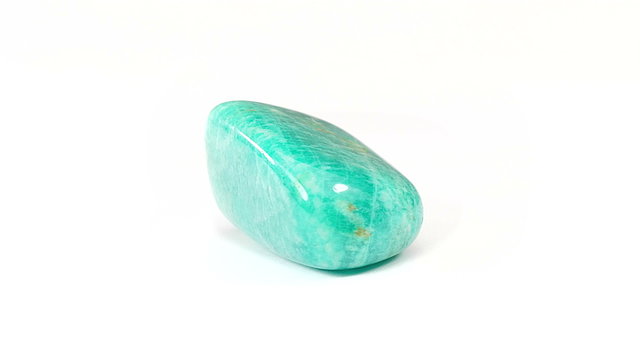 Amazonite gemstone rotating on a white background seamless loop 
