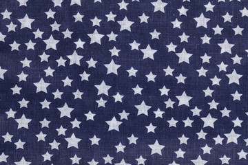 blue and white tablecloth picnic texture with stars. Textile, napkin, tablecloth. View from above, top. Traditional pattern and color.