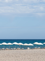 chairs with white umbrellas