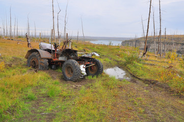 Broken tractor in the tundra.