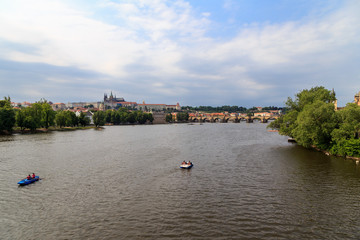 Fototapeta na wymiar PRAGUE, CZECH REPUBLIC. View of theVltava river and buildings
