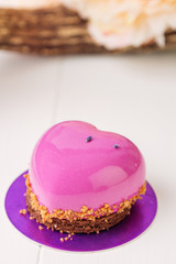 Heart shaped french pastry with pink glaze