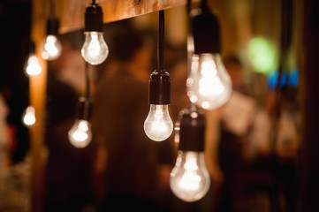 Vintage electric lamps scenery with wooden planks