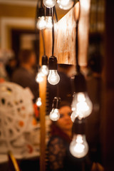 Vintage electric lamps scenery with wooden planks