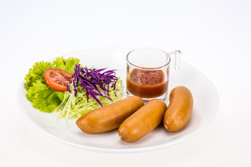 Sausage with salad for breakfast