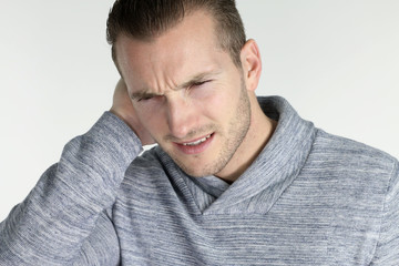 Fototapeta premium otitis - young man with an ear infection