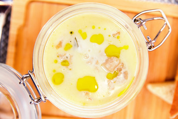 Polenta with truffles in a pot