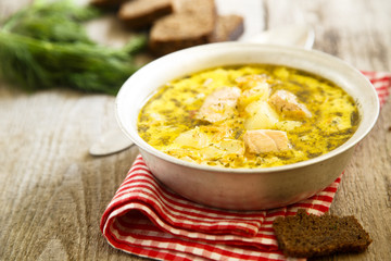 Finnish salmon soup with cream and vegetables