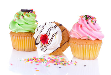 white and pink cupcake and green Lots of Colorful Sprinkles on W