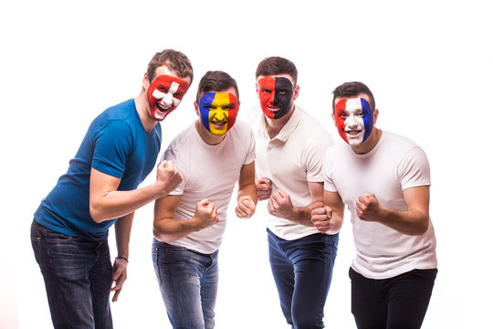 Group of football fans support their national team at camera on white background. European 2016 football fans concept.