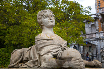 Fototapeta na wymiar Ancient sculpture of a woman-sphinx in the palace park in Massandra, Crimea