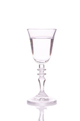 the glass of vodka on white background