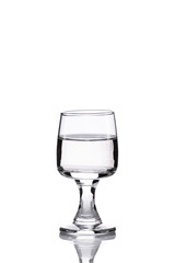the glass of vodka on white background