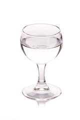 the glass of vodka on white background