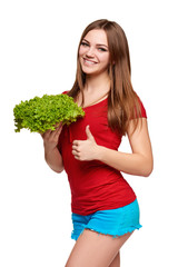 Happy woman with lettuce