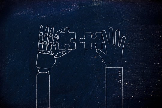 human and robot hands solving a puzzle
