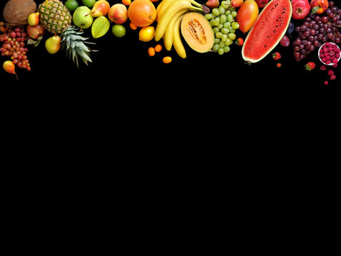 Deluxe fruits background. Studio photography different fruits isolated on black background. Copy space. High resolution product