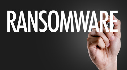 Hand writing the text: Ransomware