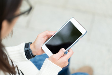 Top view of woman use of mobile phone