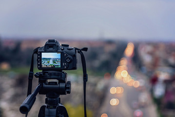 DSLR Camera taking photos of the city