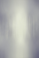 blurred dark gray gradient background with vertical stripes
