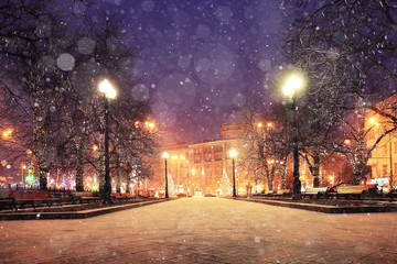 Naklejka premium background blur city evening snow