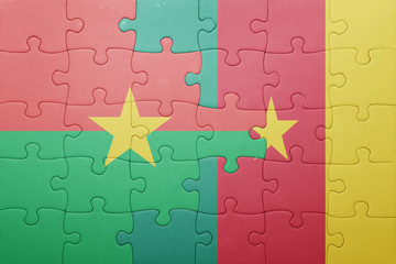 puzzle with the national flag of burkina faso and cameroon