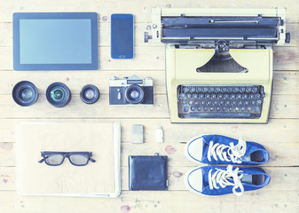 Tablet, phone, camera, lenses, album, glasses and different obje