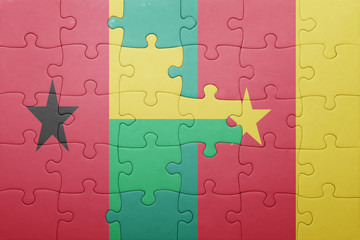 puzzle with the national flag of guinea bissau and cameroon
