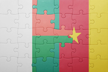 puzzle with the national flag of madagascar and cameroon